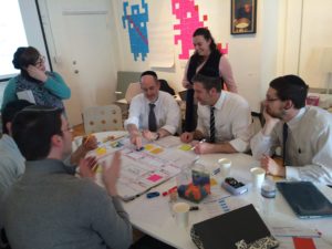 Working together on developing games at the Institute of Play.
